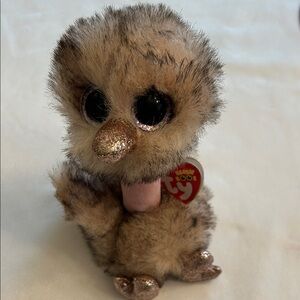 Ty Beanie Boo Plush with Glitter Accents
Henna the Brown and Pink Ostrich